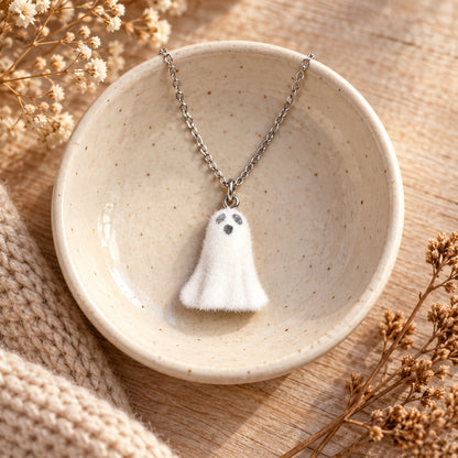 Happy Ghost Necklace in a cream ceramic bowl