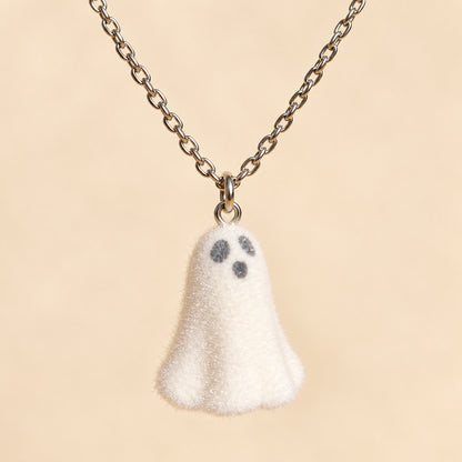 Close-up of Happy Ghost Necklace charm and silver chain