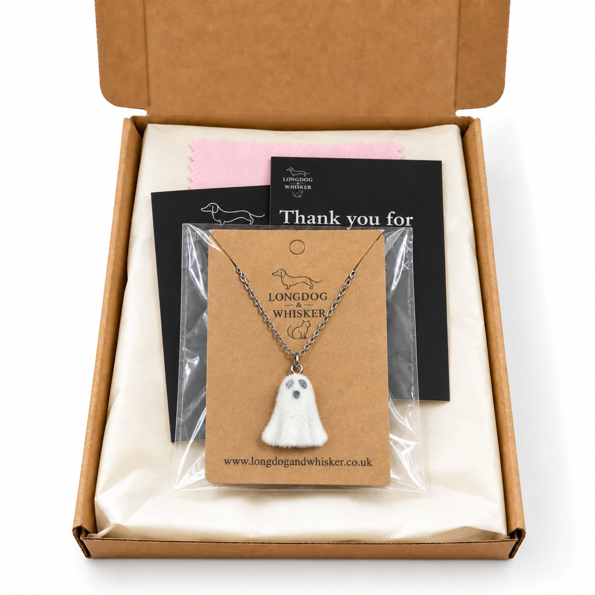 Happy Ghost Necklace packed in a Longdog & Whisker gift box