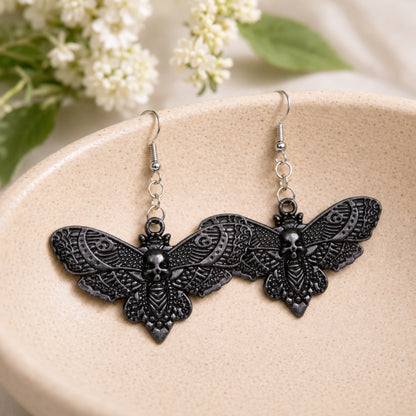 Black Butterfly Earrings displayed in a lifestyle product photo