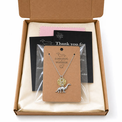 Silver Brontosaurus Dinosaur Necklace with Longdog & Whisker packaging