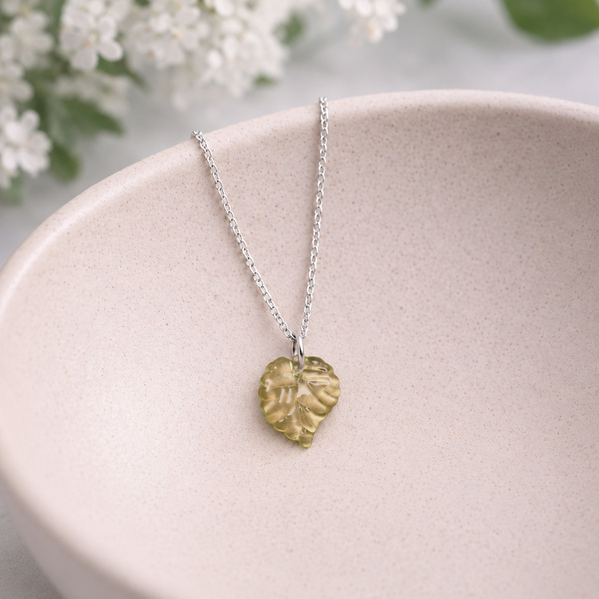 Silver Leaf Necklace displayed in a lifestyle product photo