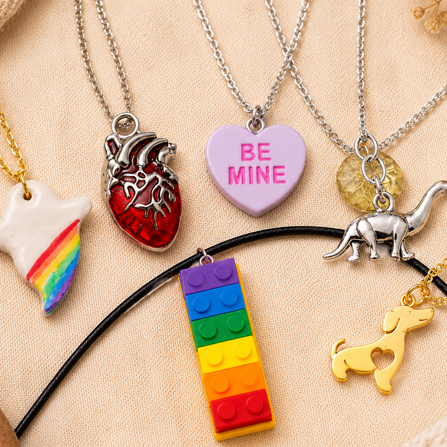 Collection of various necklaces with unique pendants on a beige background