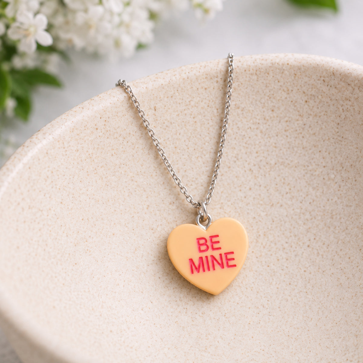 Be Mine Necklace - Orange displayed in a lifestyle product photo