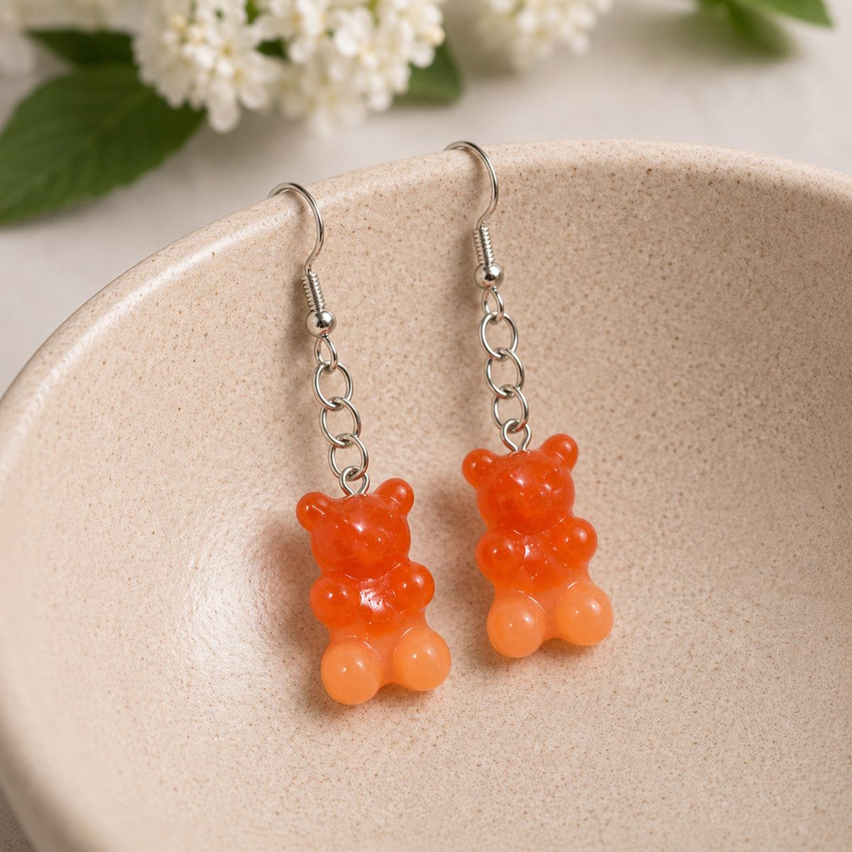 Gummy Bear Earrings - Orange displayed in a lifestyle product photo