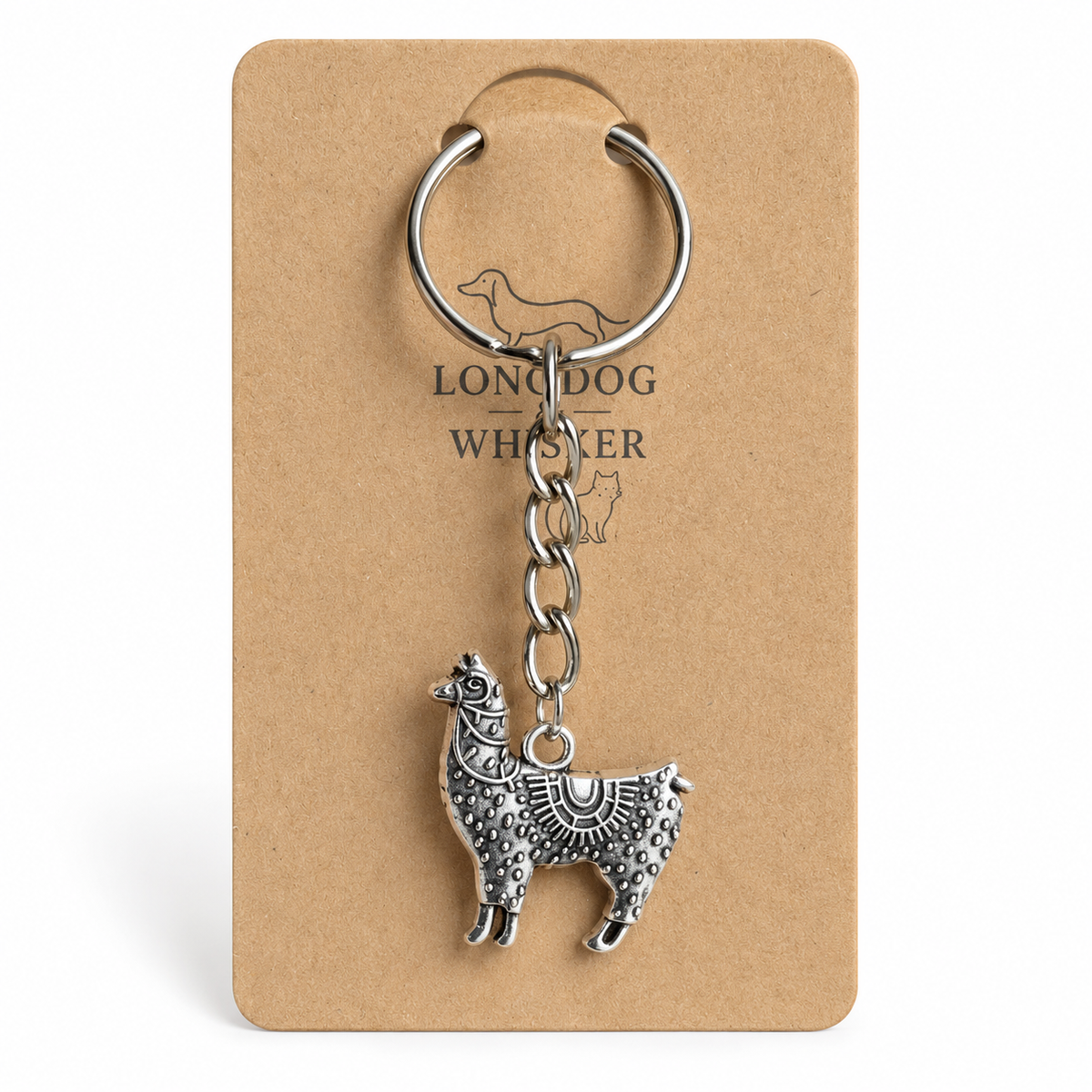 Close-up of ornate silver-tone llama keyring and chain