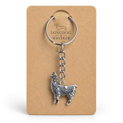 Ornate silver-tone llama keyring on Longdog & Whisker display card