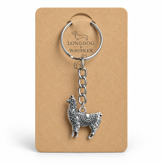 Ornate silver-tone llama keyring on Longdog & Whisker display card