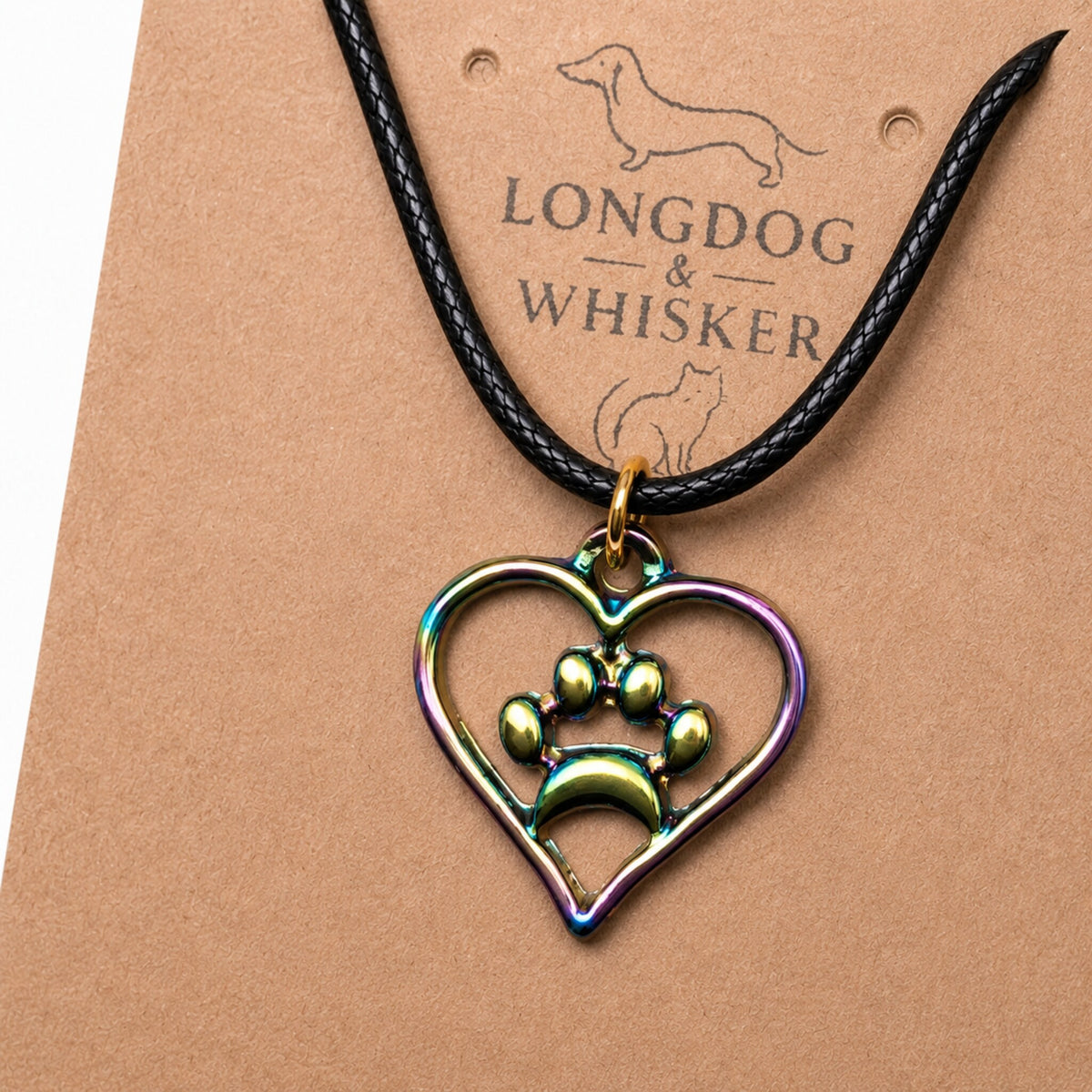 Close-up detail of Iridescent Heart Dog Paw Print Necklace
