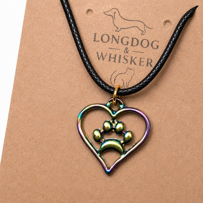 Close-up detail of Iridescent Heart Dog Paw Print Necklace