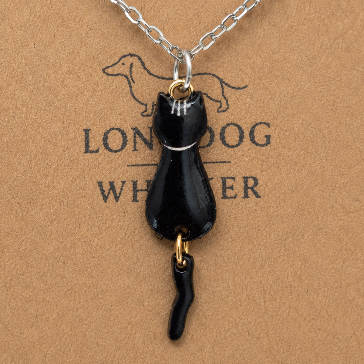 Close up of Percy Cat Necklace pendant and tail detail
