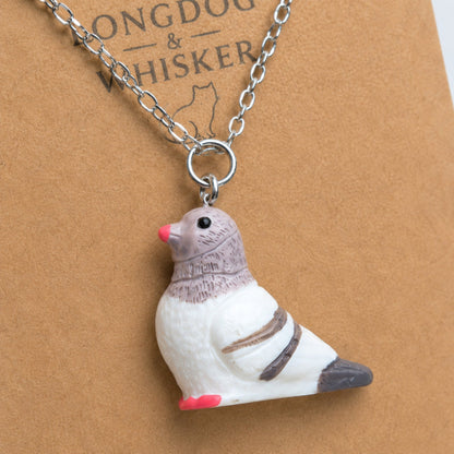 Close-up detail of Pigeon Necklace on Longdog & Whisker product card
