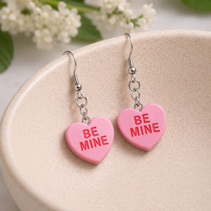 Be Mine Heart Earrings - Pink displayed in a lifestyle product photo