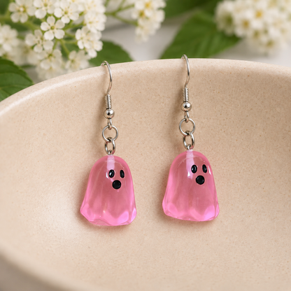 Pink Ghost Earrings arranged in a ceramic bowl
