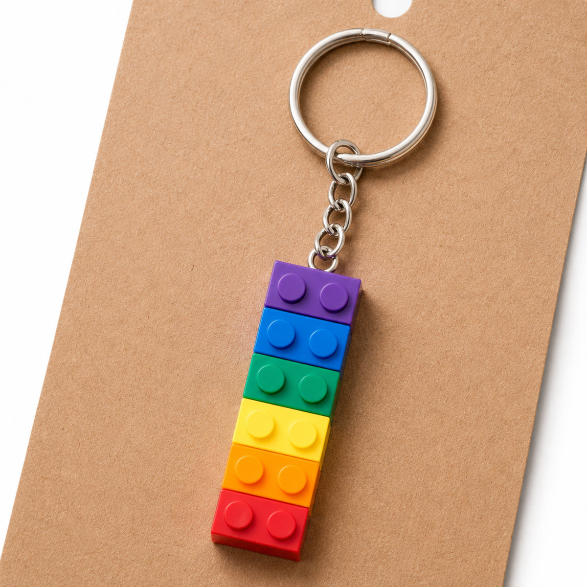 Close-up detail of Pride Brick Keyring - Purple to Red