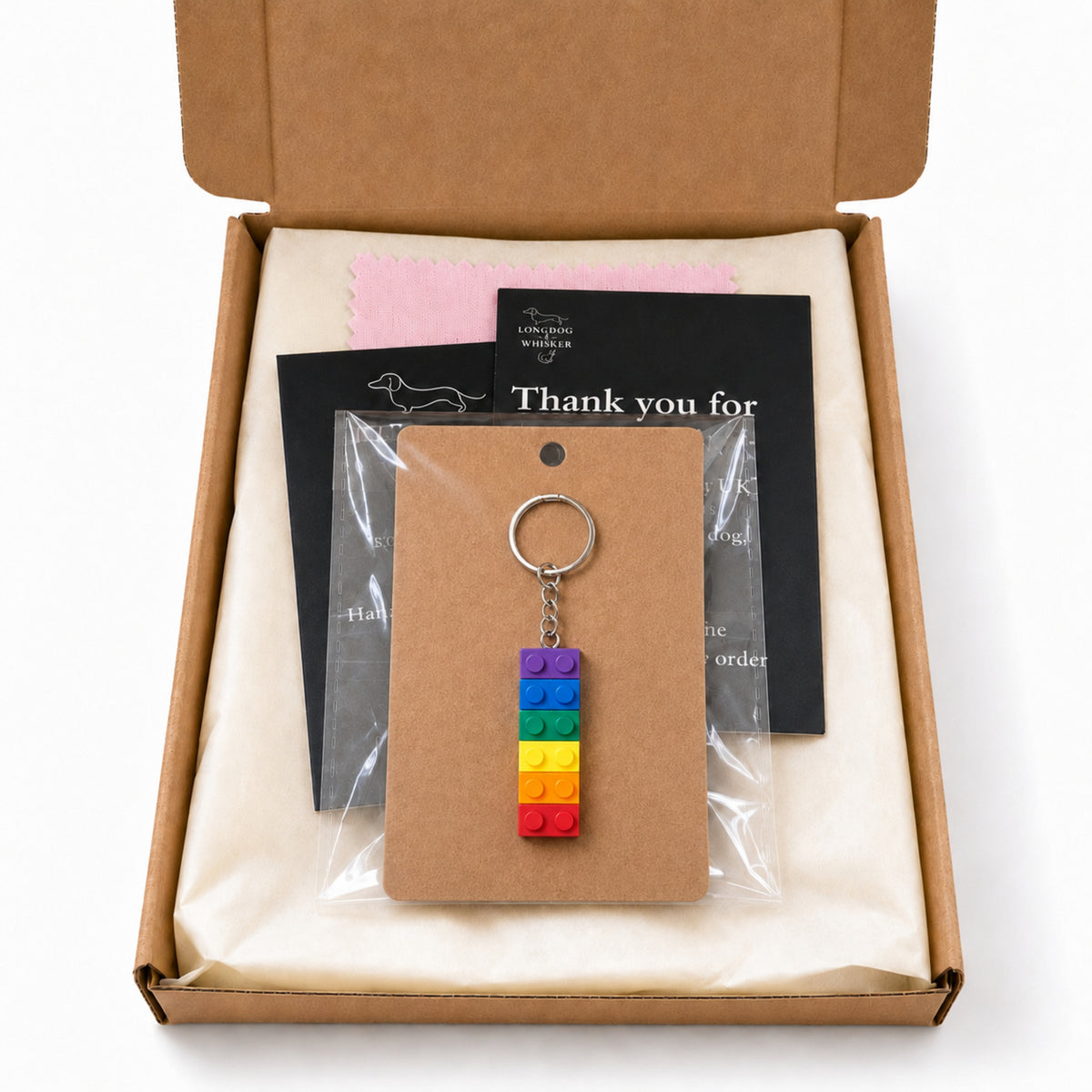 Pride Brick Keyring - Purple to Red with Longdog & Whisker packaging