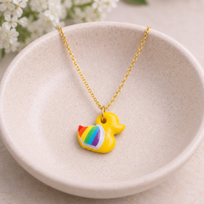 Pride Ducky Necklace Gold Chain displayed in a lifestyle product photo