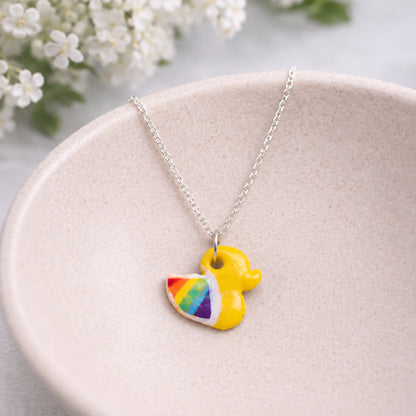 Pride Ducky Necklace Silver Chain displayed in a lifestyle product photo