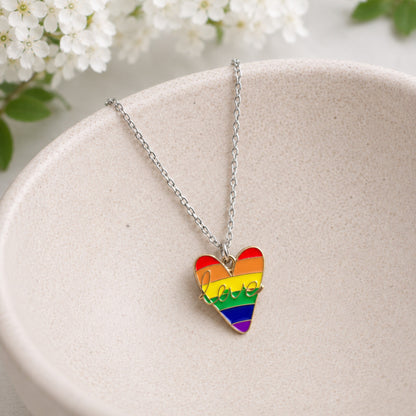Pride Rainbow Love Heart Necklace Silver Chain displayed in a lifestyle product photo