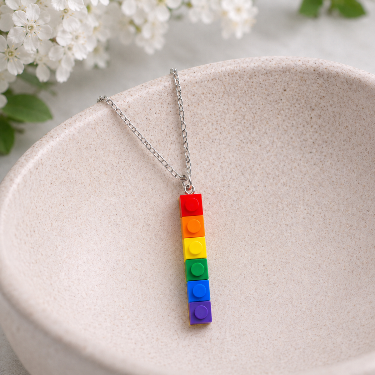 Pride Single Brick Necklace Red to Purple Silver Chain displayed in a lifestyle product photo