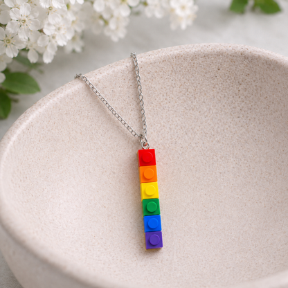 Pride Single Brick Necklace Red to Purple Silver Chain displayed in a lifestyle product photo