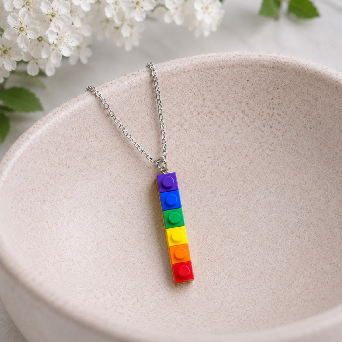 Pride Single Brick Necklace Purple to Red Silver Chain displayed in a lifestyle product photo