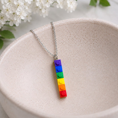 Pride Single Brick Necklace Purple to Red Silver Chain displayed in a lifestyle product photo