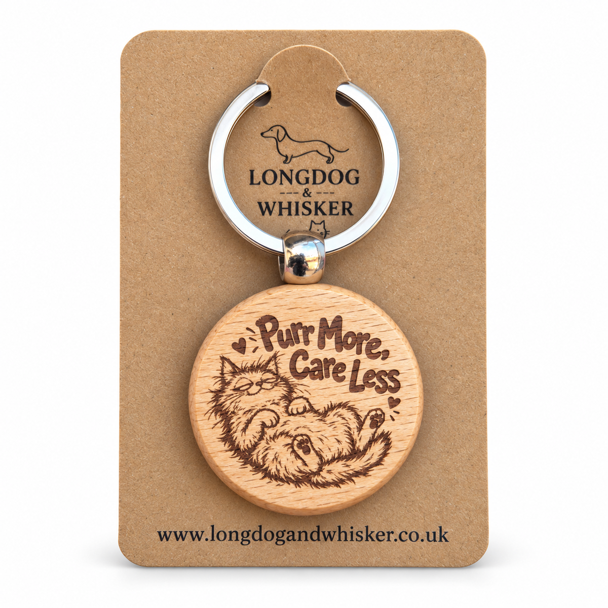 Purr More Care Less wooden keyring with lounging cat on Longdog & Whisker card