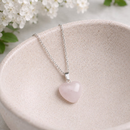 Rose Quartz Heart Necklace displayed in a lifestyle product photo
