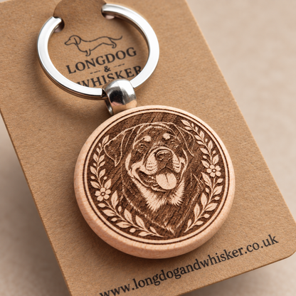 Close-up of the printed Rottweiler wooden keyring and silver-tone hardware
