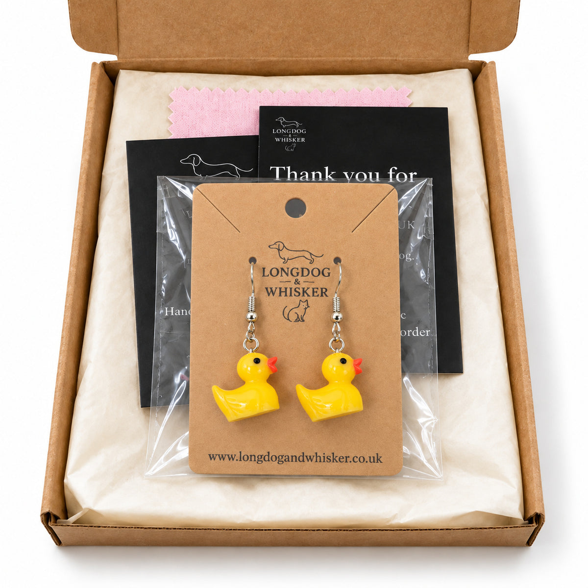 Rubber duck earrings on their card in Longdog & Whisker gift-ready packaging