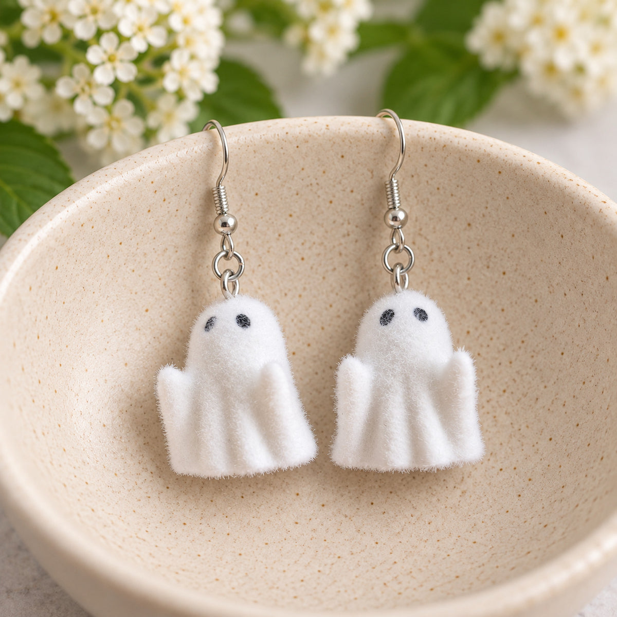 Rudie Ghost Earrings in a ceramic bowl