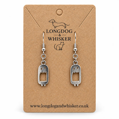Screaming monster drop earrings on Longdog & Whisker kraft card