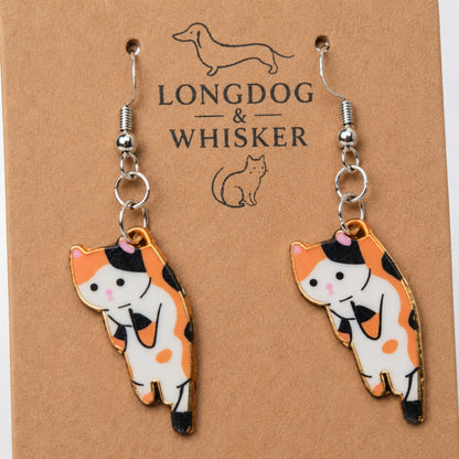 Close-up detail of Scruffles Cat Earrings - Calico