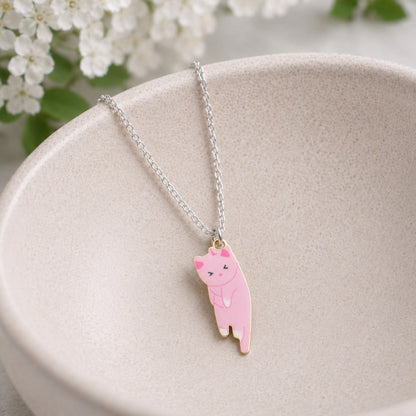 Scruffles Cat Necklace - Pink displayed in a lifestyle product photo