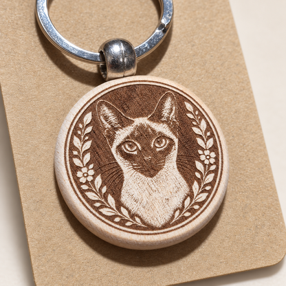 Close-up of the Siamese cat wooden keyring engraving