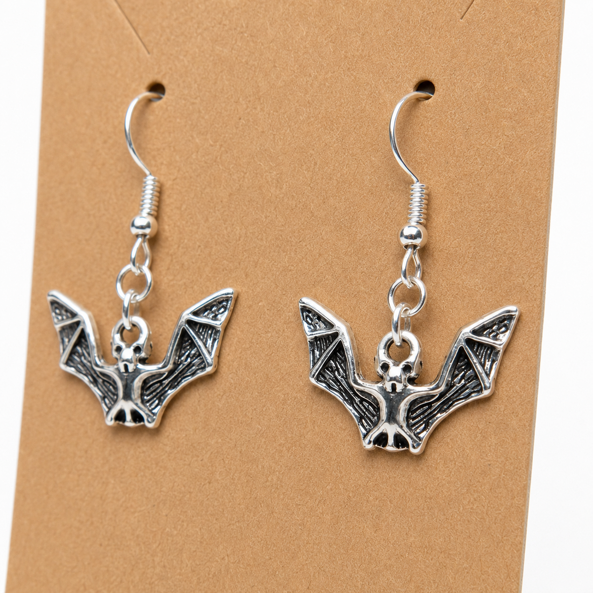Close-up detail of Silver Bat Drop Earrings