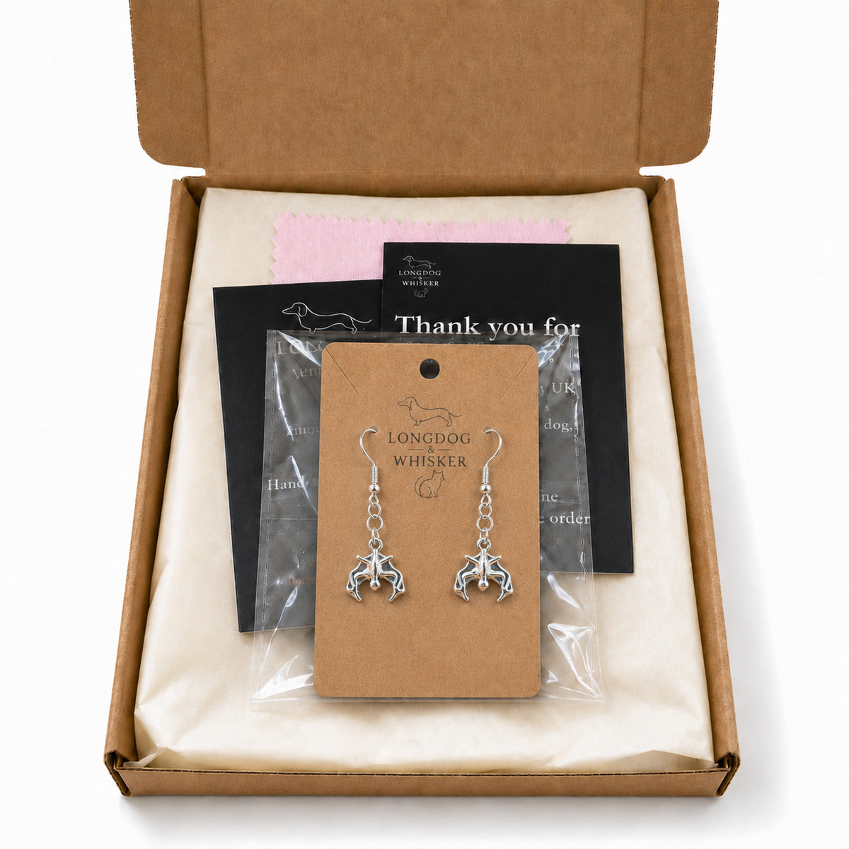 Silver bat earrings in Longdog & Whisker packaging