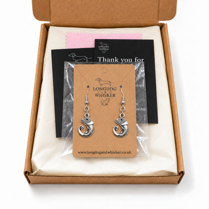 Silver-tone chameleon earrings in Longdog & Whisker kraft packaging