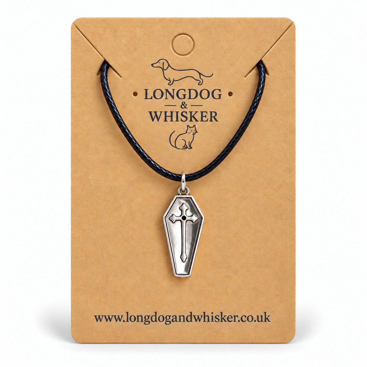 Silver coffin cross necklace on black cord displayed on a Longdog & Whisker kraft card.