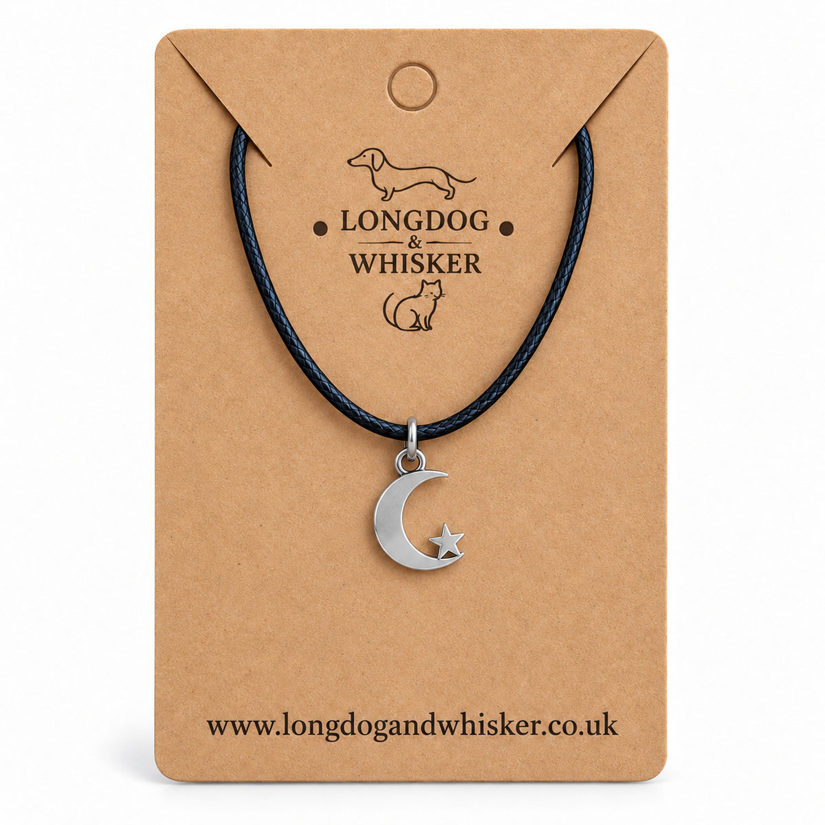 Silver crescent moon and star necklace on black cord on its kraft product card