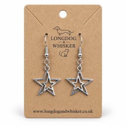 Silver double star drop earrings on a Longdog & Whisker kraft display card.