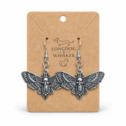 Silver Skull Moth Earrings on Longdog & Whisker display card