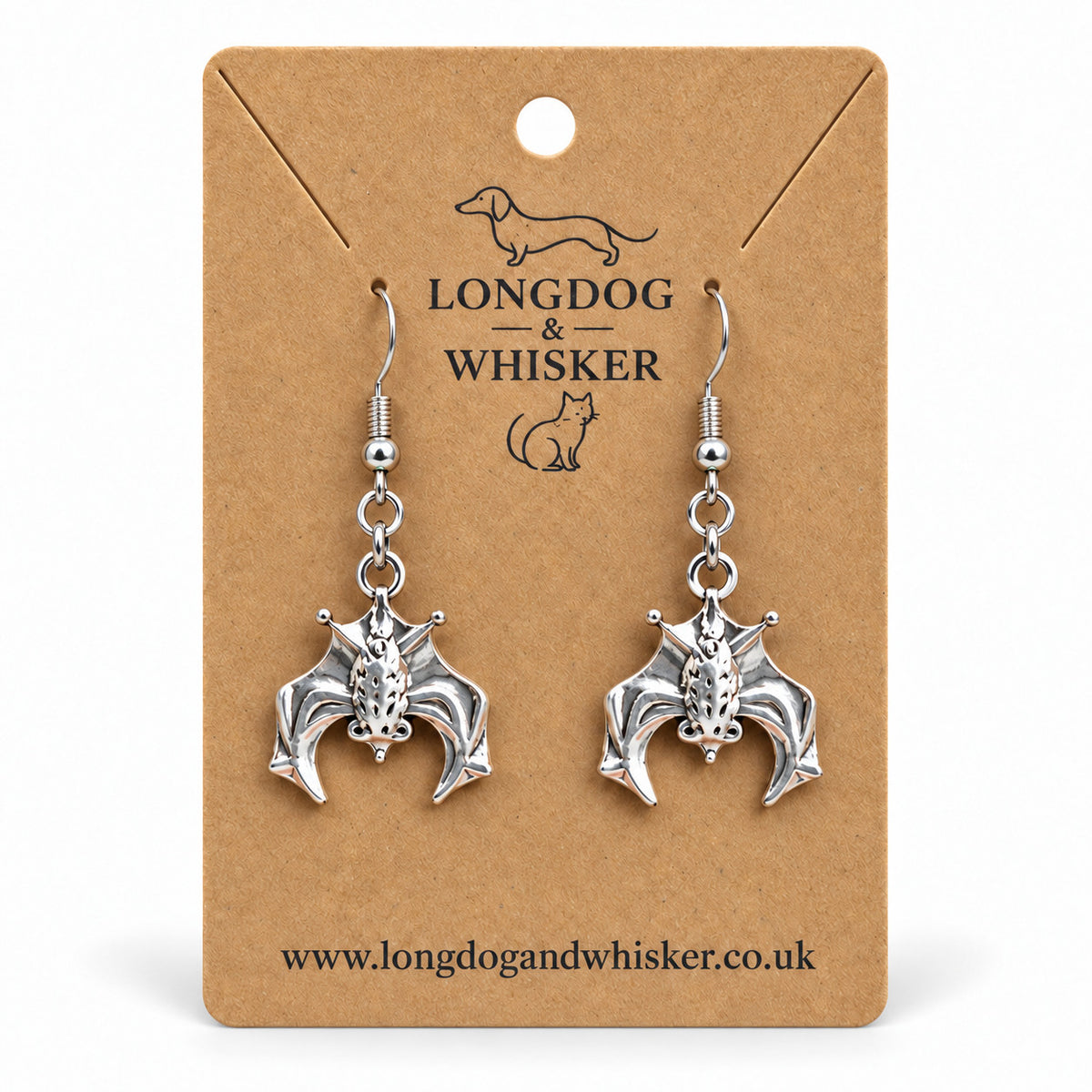 Silver hanging bat drop earrings on Longdog & Whisker kraft card