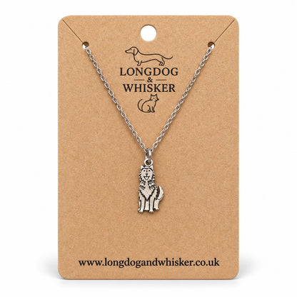 Silver Husky Necklace on a silver-tone chain displayed on a Longdog & Whisker kraft card
