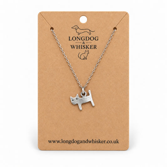 Silver Little Cat Necklace on a silver-tone chain displayed on a Longdog & Whisker kraft card