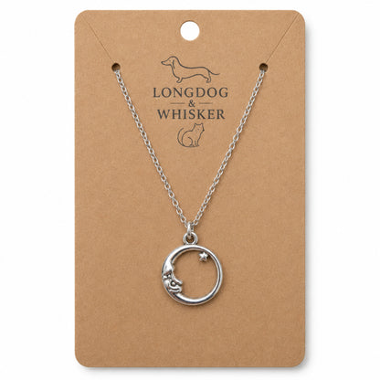Silver moon and star necklace on Longdog & Whisker product card