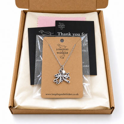 Silver-tone octopus chain necklace in Longdog & Whisker kraft packaging