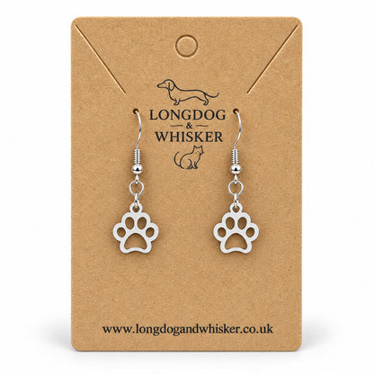 Silver openwork paw print drop earrings on Longdog & Whisker kraft card