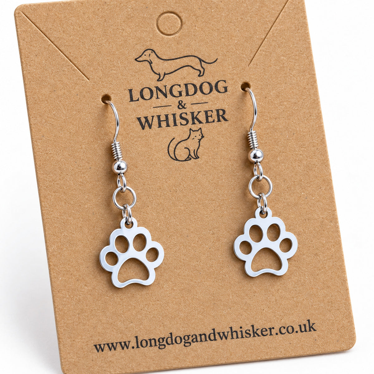 Close-up of silver-tone cut-out paw charms and hooks